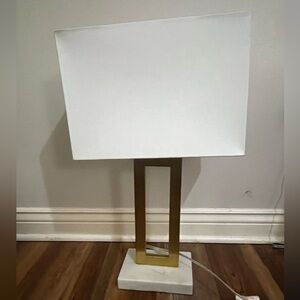 Square gold and white lamp.